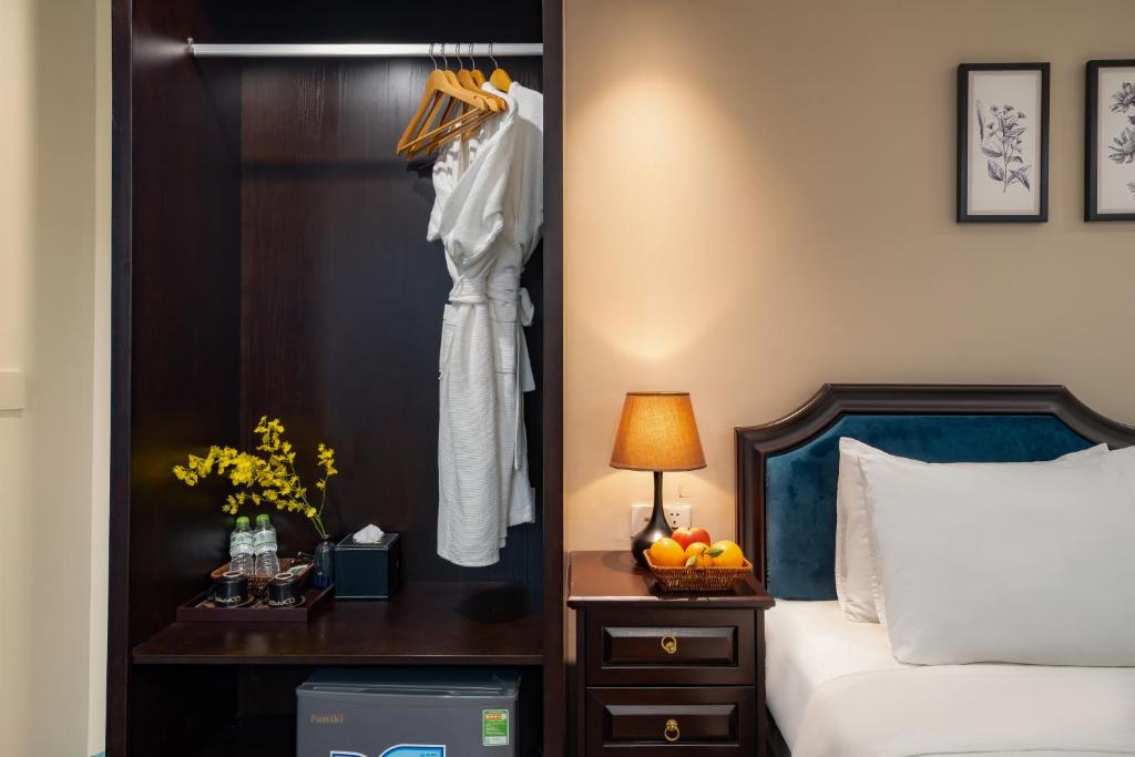 Postel nebo postele na pokoji v ubytování Hanoi Fiesta Grand Hotel and Spa