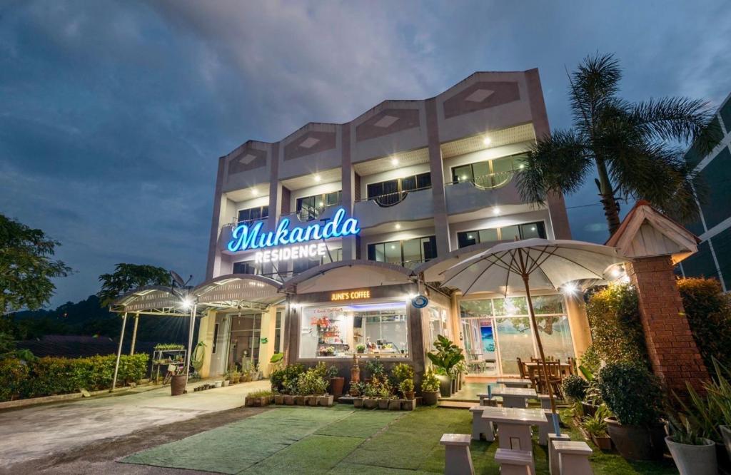 a building with a sign that reads malanda at Mukanda Residence in Ao Nang Beach