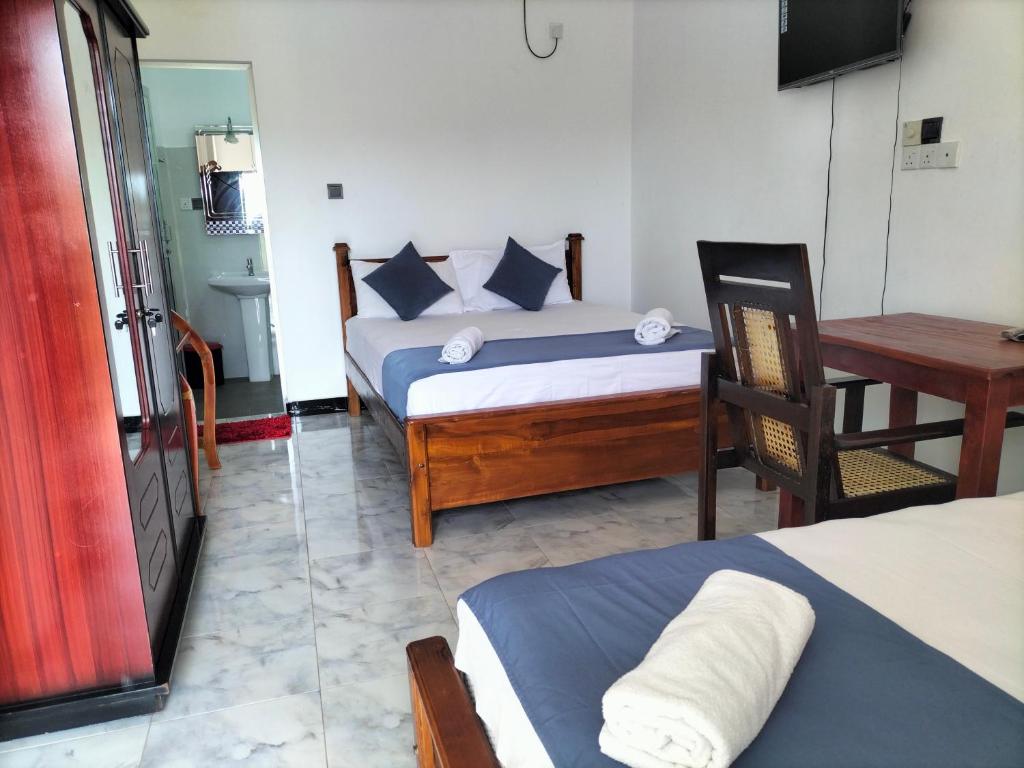 Postel nebo postele na pokoji v ubytování Hotel Sun Blue