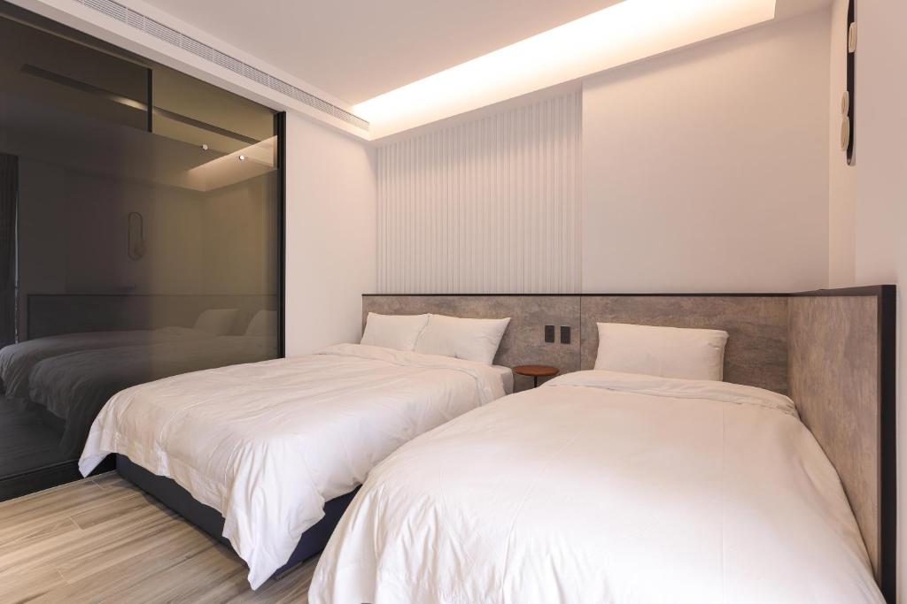 Postel nebo postele na pokoji v ubytování Sea Thought B&B