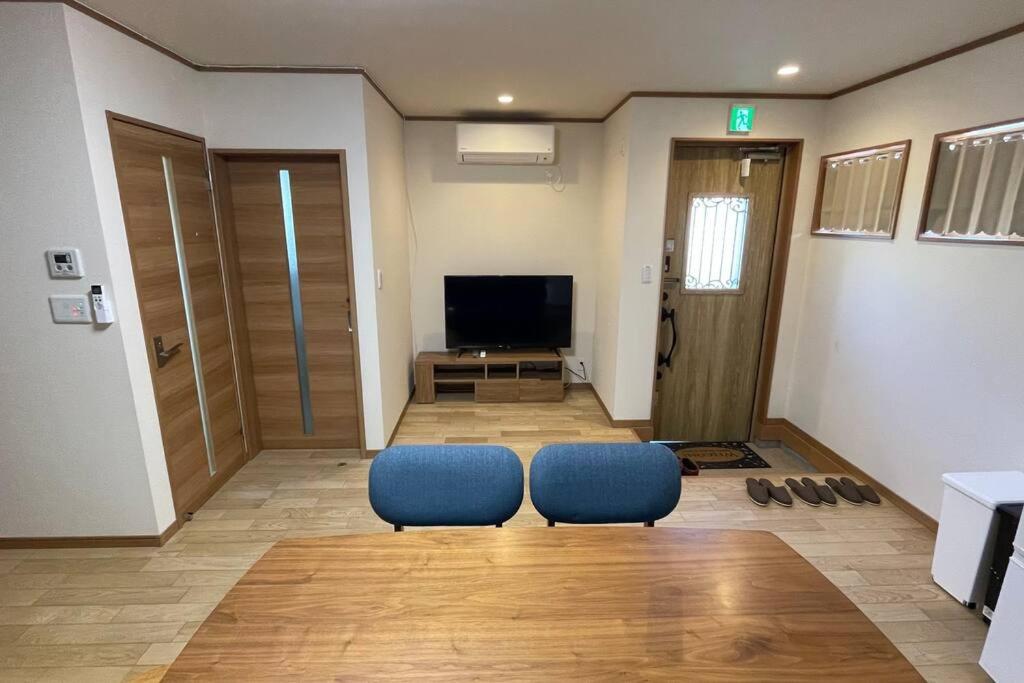 TV a/nebo společenská místnost v ubytování 富士山下Cottage-B