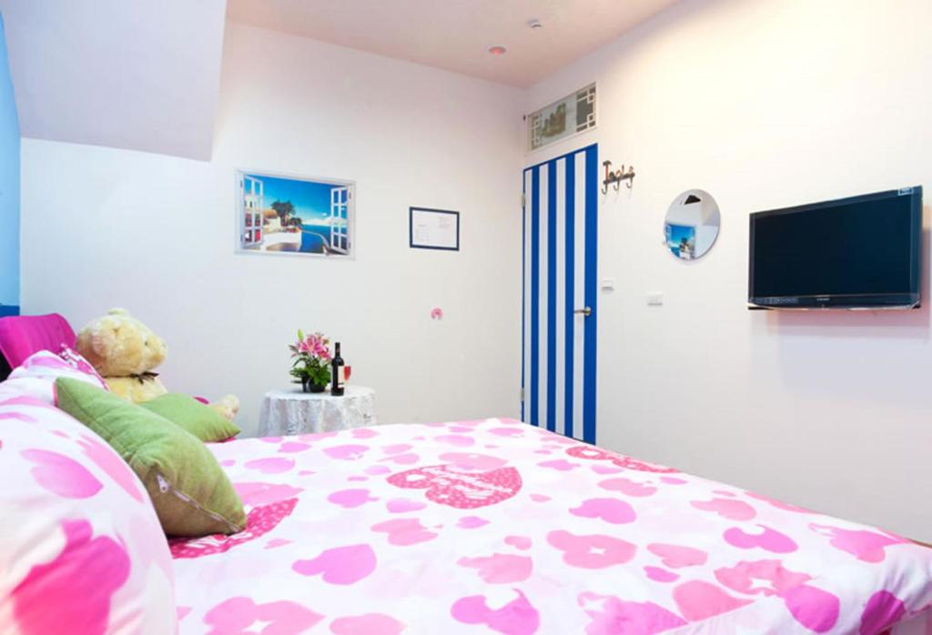 TV a/nebo společenská místnost v ubytování Free World B&B