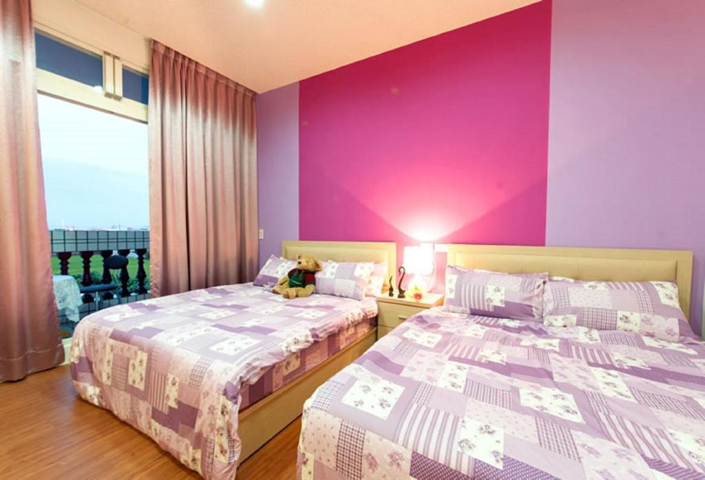 Postel nebo postele na pokoji v ubytování Free World B&B