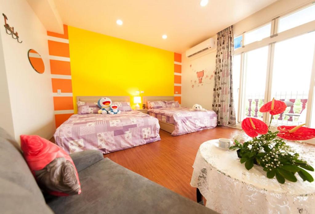 Postel nebo postele na pokoji v ubytování Free World B&B