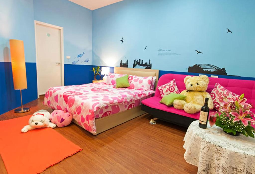 Postel nebo postele na pokoji v ubytování Free World B&B