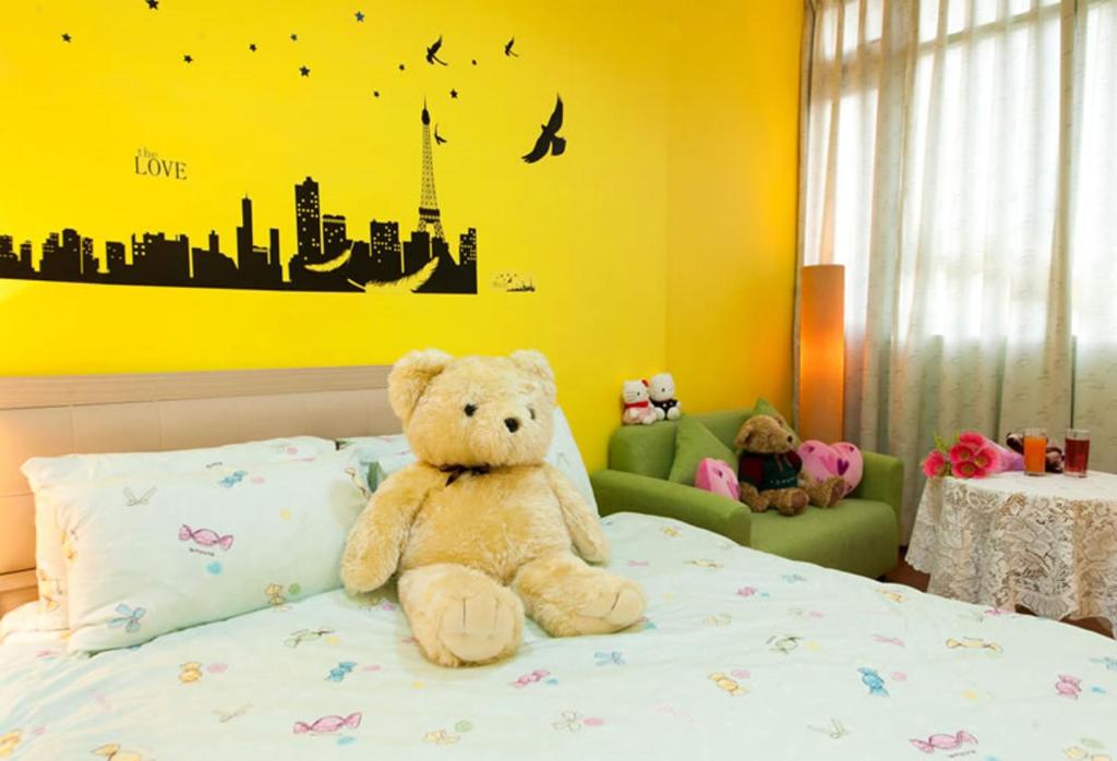 Postel nebo postele na pokoji v ubytování Free World B&B