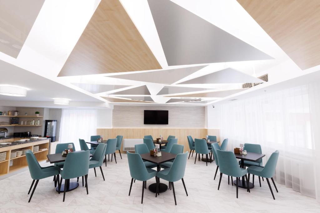 TV a/nebo společenská místnost v ubytování Hotel YVY