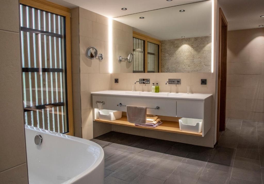 Koupelna v ubytování Almhotel Hochhäderich