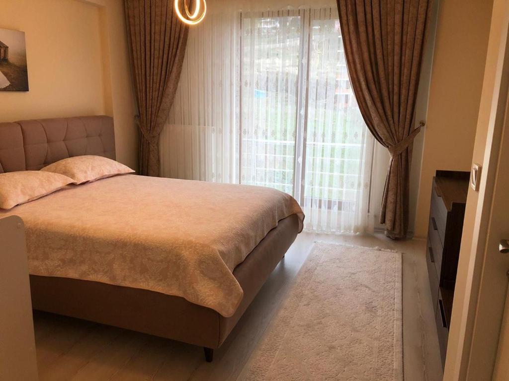 Postel nebo postele na pokoji v ubytování Alians Group Referance Apartmens