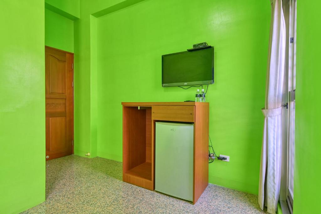 TV a/nebo společenská místnost v ubytování Chunfa B&B