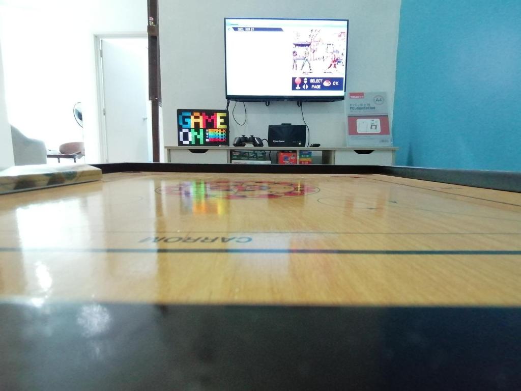 TV a/nebo společenská místnost v ubytování Homestay 88A Melaka for 9 pax with Private Pool, Smart TV, Netflix and Wifi