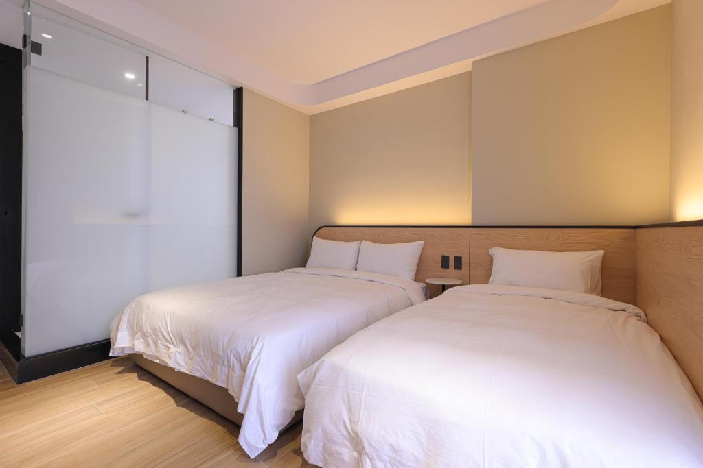 Postel nebo postele na pokoji v ubytování Sea Thought B&B