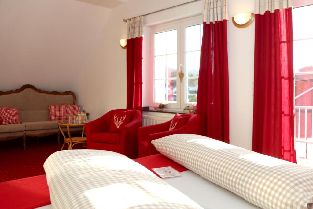 Postel nebo postele na pokoji v ubytování Hotel Garni Dorfkammer
