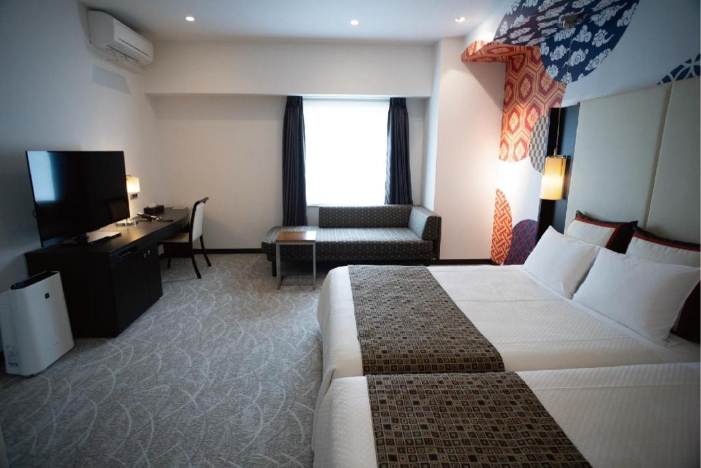 TV a/nebo společenská místnost v ubytování Hotel Bestland