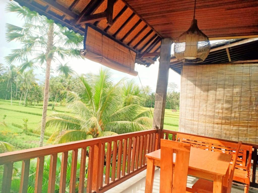 Balkón nebo terasa v ubytování Intan Villa & Suite Ubud