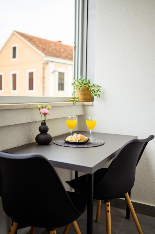 Nápoje v ubytování Apartman Olimp
