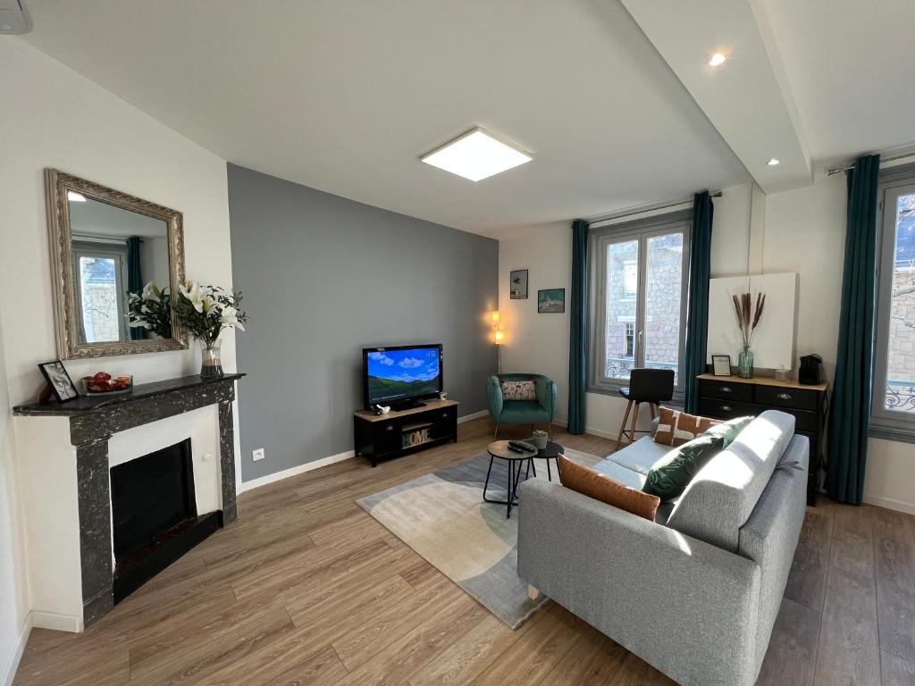 Televízia a/alebo spoločenská miestnosť v ubytovaní Charmant appartement T2 cosy climatisé