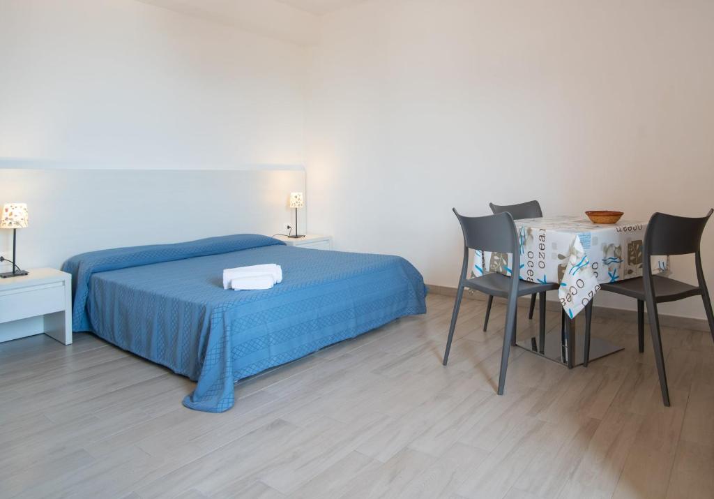 Posteľ alebo postele v izbe v ubytovaní Testa di Monaco - Basic Beach Accommodations