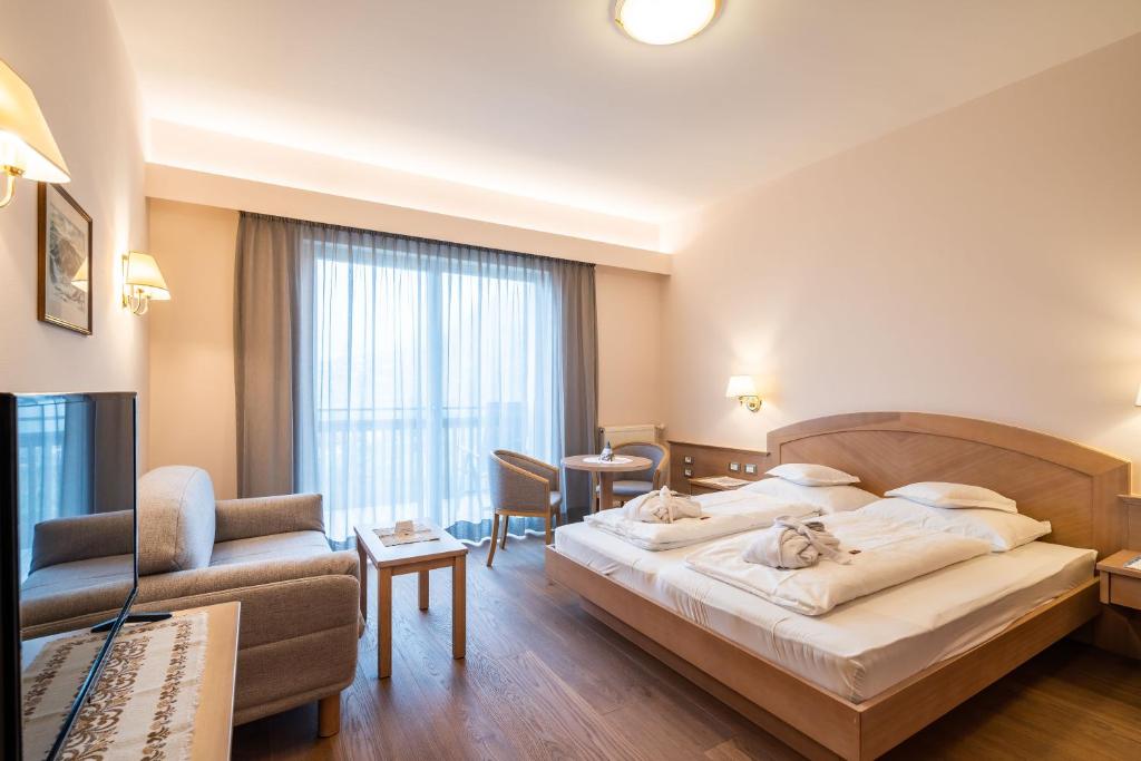 Postel nebo postele na pokoji v ubytování Hotel Wessobrunn