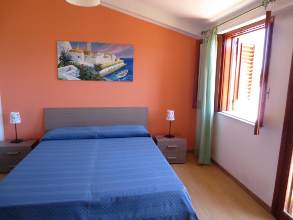 Posteľ alebo postele v izbe v ubytovaní Testa di Monaco - Basic Beach Accommodations