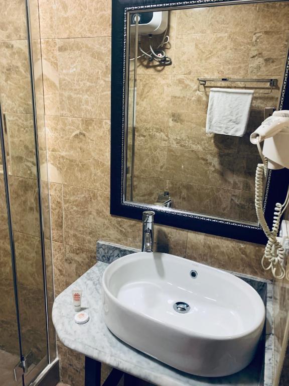 Koupelna v ubytování Msquare Hotel GRA