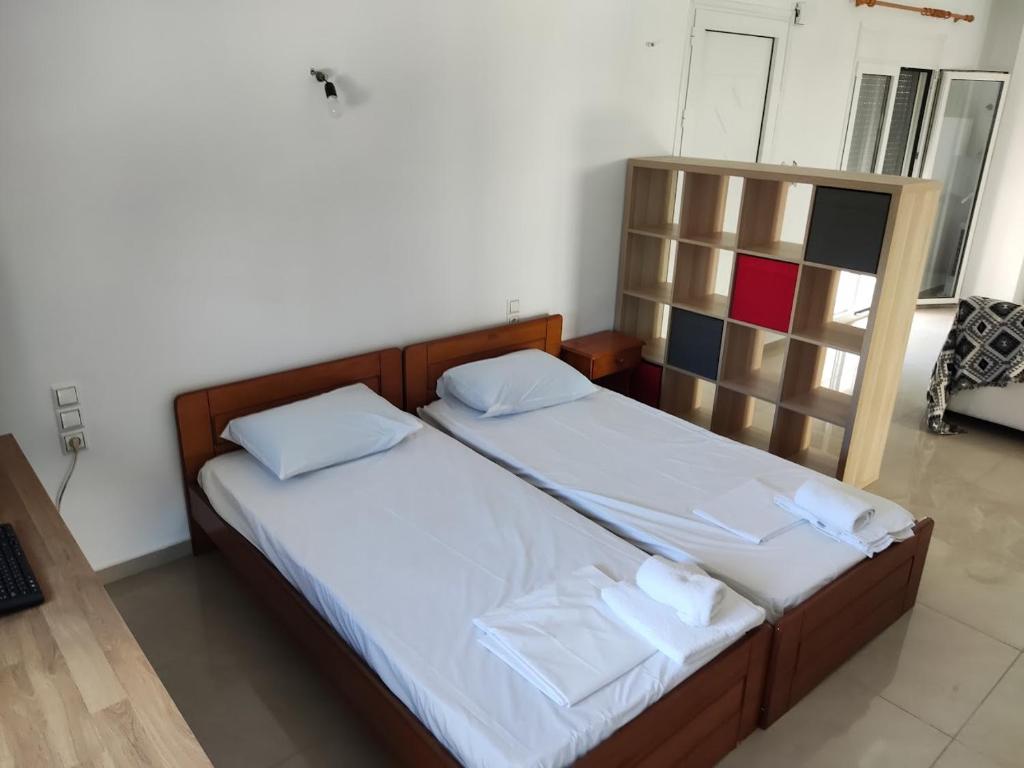Postel nebo postele na pokoji v ubytování ZanteJardins