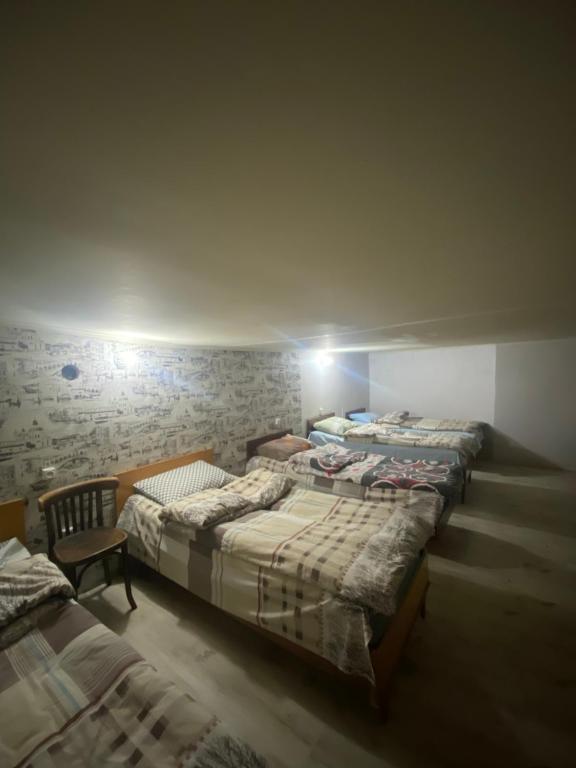 Postel nebo postele na pokoji v ubytování T Rooms