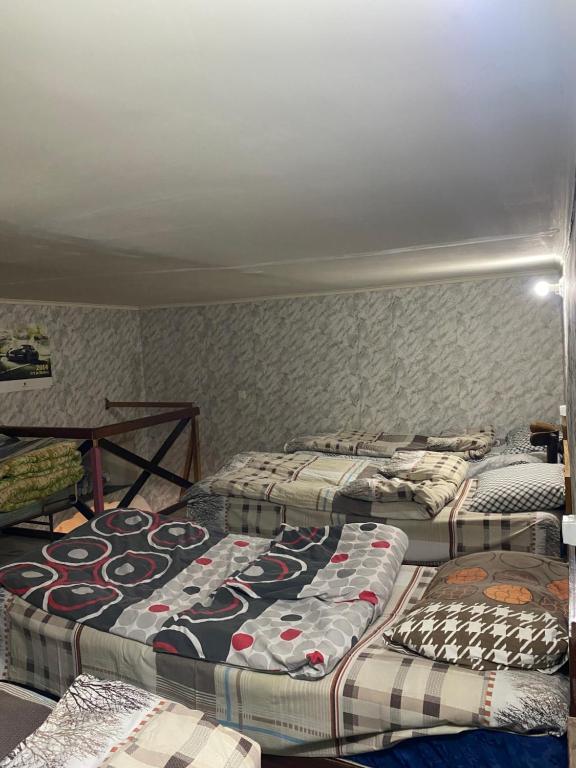 Postel nebo postele na pokoji v ubytování T Rooms