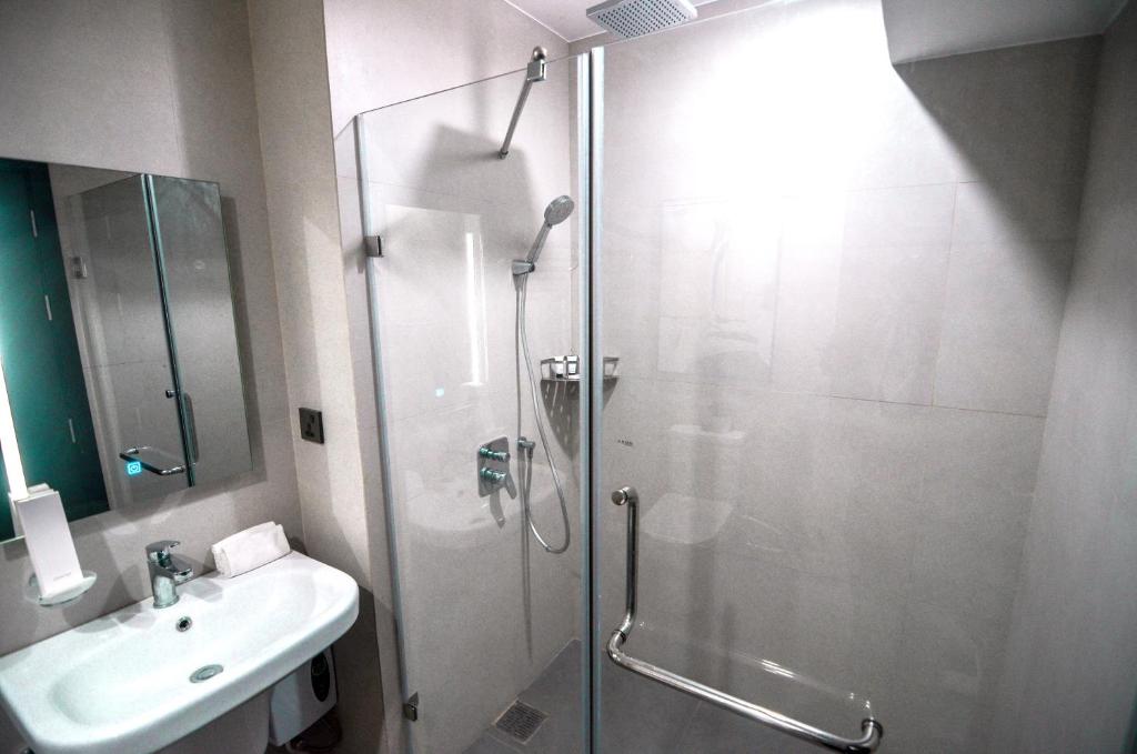 Koupelna v ubytování AEON SUITES Staycation
