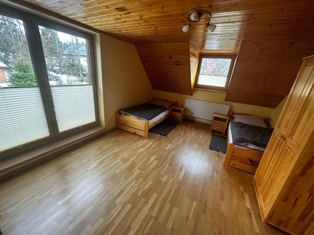 Postel nebo postele na pokoji v ubytování Chata Diana