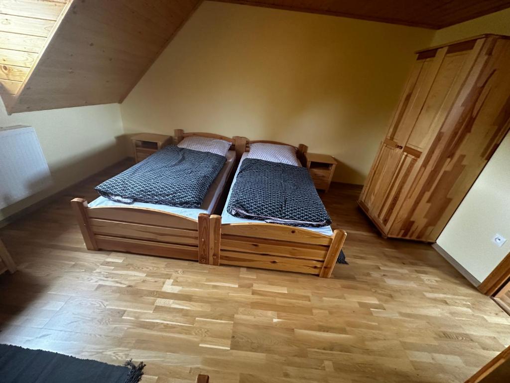 Postel nebo postele na pokoji v ubytování Chata Diana