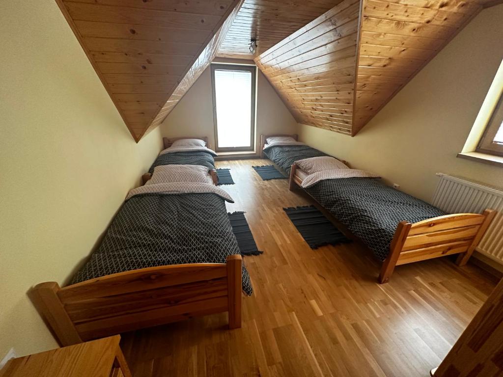 Postel nebo postele na pokoji v ubytování Chata Diana