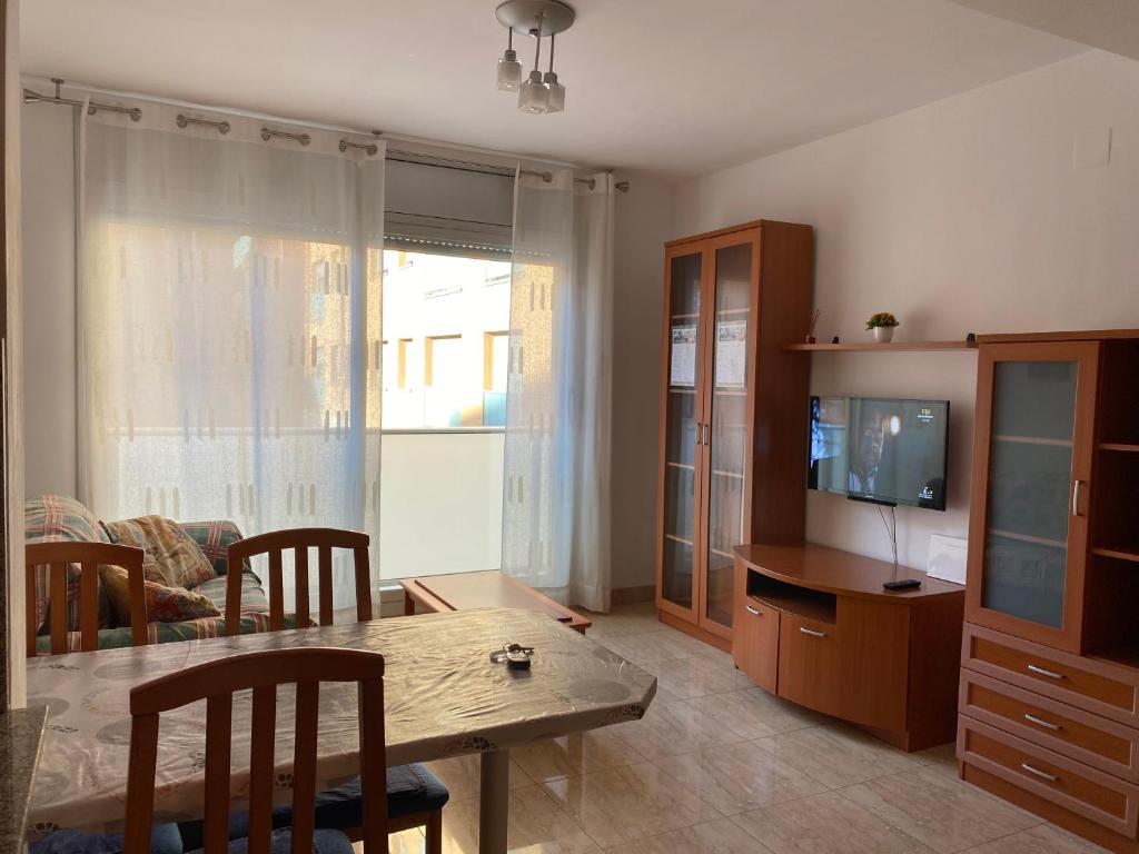 A television and/or entertainment centre at Joan XXIII Apartment