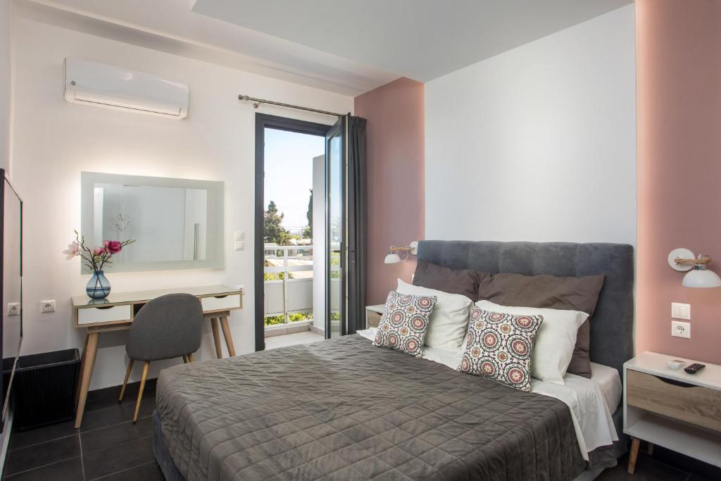 Postel nebo postele na pokoji v ubytování Faliro Hotel