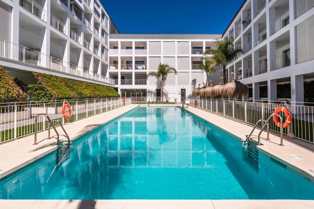 an image of a swimming pool in a apartment building at Apartamento Dora Maar I in Marbella