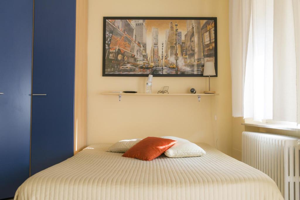 A bed or beds in a room at B&B - Il Portichetto