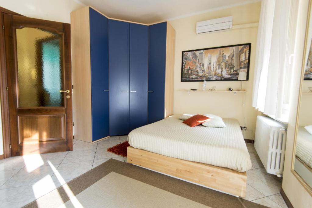 A bed or beds in a room at B&B - Il Portichetto