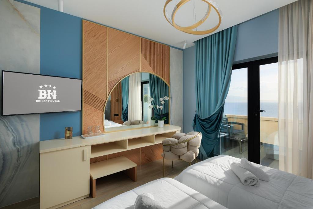Postel nebo postele na pokoji v ubytování Hotel Brilant Saranda