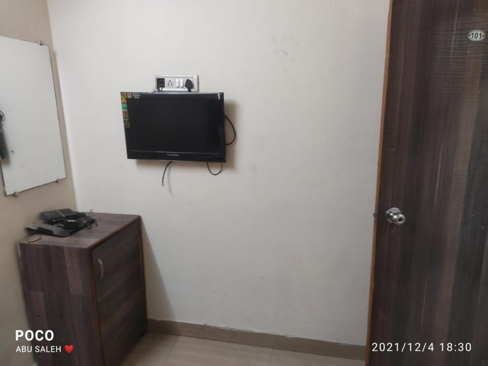 A television and/or entertainment centre at Hotel janata Residency