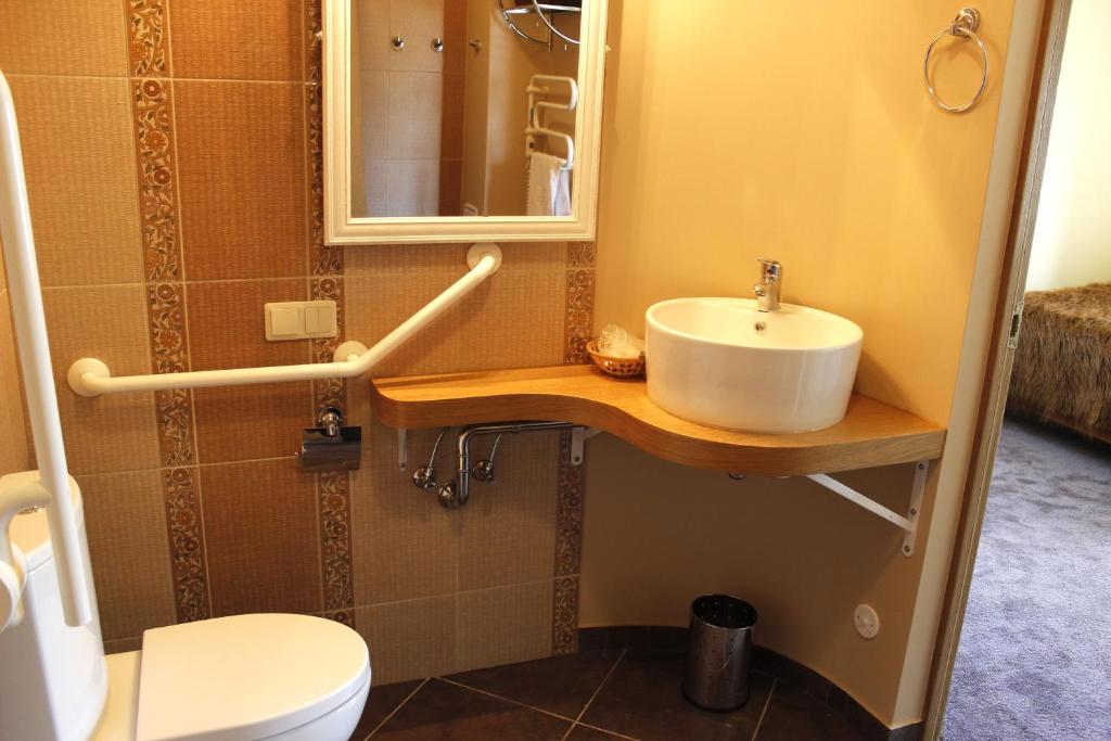 Koupelna v ubytování Hotel Senlīči