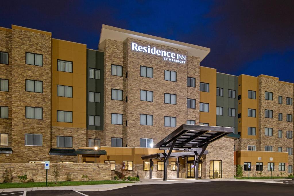 a rendering of the restoration inn hotel at night at Residence Inn by Marriott Louisville East/Oxmoor in Louisville