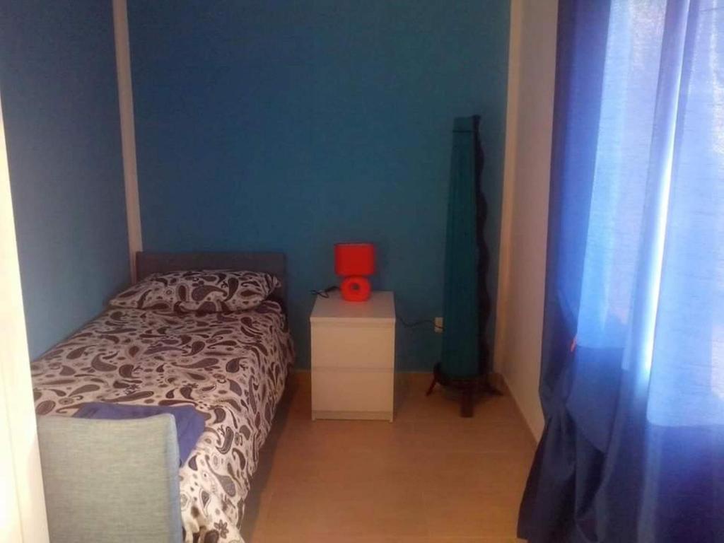 A bed or beds in a room at B&B Pian del Lago