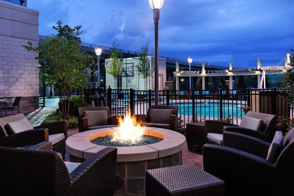 a fire pit in the middle of a patio at Residence Inn by Marriott Little Rock Downtown in Little Rock