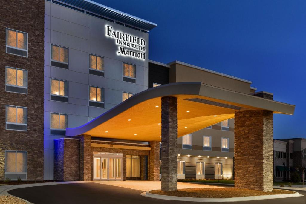 a rendering of the entrance to the extended living center at night at Fairfield Inn & Suites by Marriott Boulder Longmont in Longmont