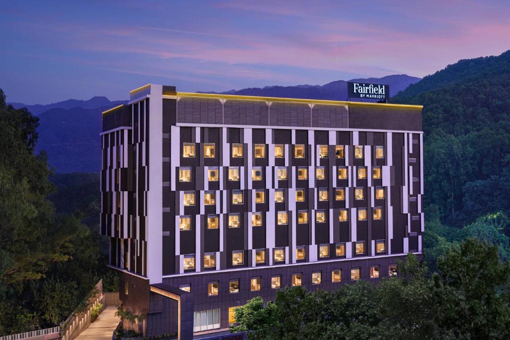 a rendering of a building with lights on at Fairfield by Marriott Dehradun in Dehradun