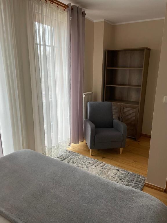 Posedenie v ubytovaní Apartament Mikołajki