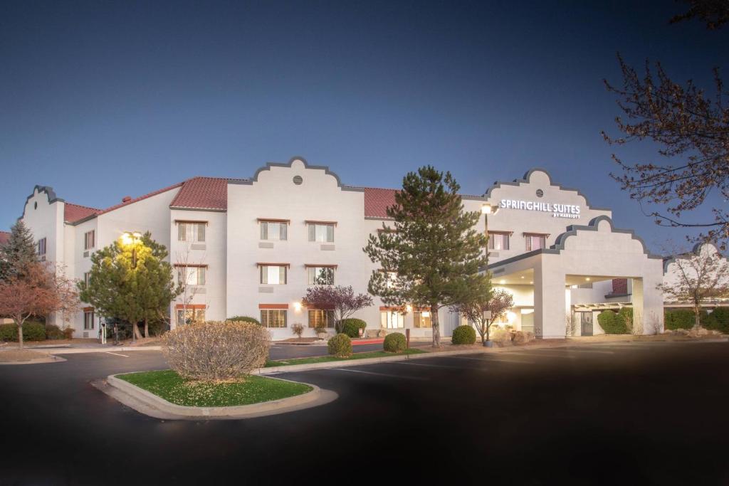 a large white building with a street in front of it at SpringHill Suites Prescott in Prescott