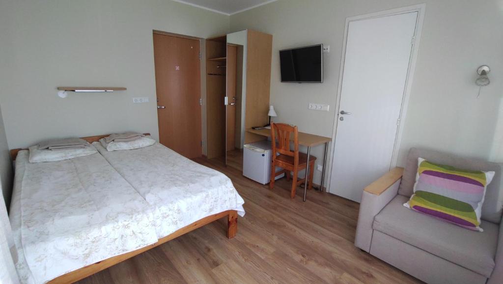 Postel nebo postele na pokoji v ubytování Aisa Accommodation