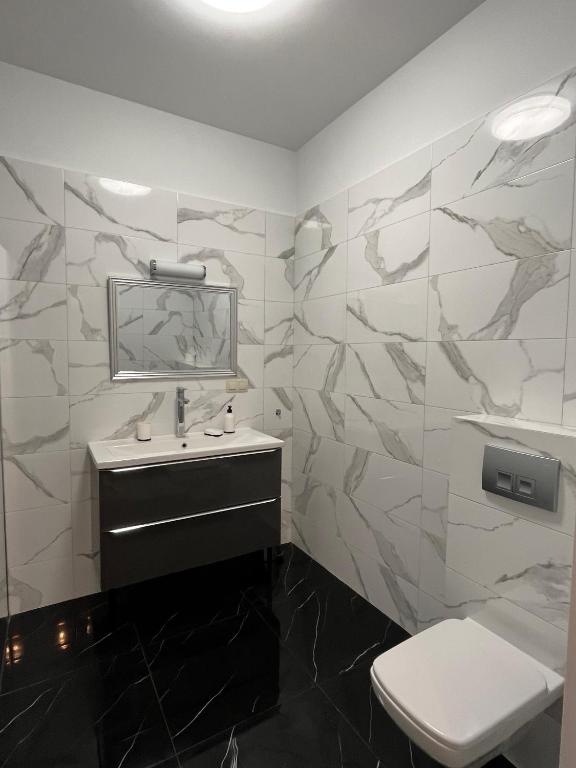 Kúpeľňa v ubytovaní Apartament Marko