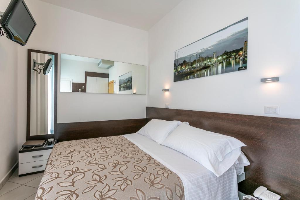 Postel nebo postele na pokoji v ubytování Hotel Baya - in centro, sul mare